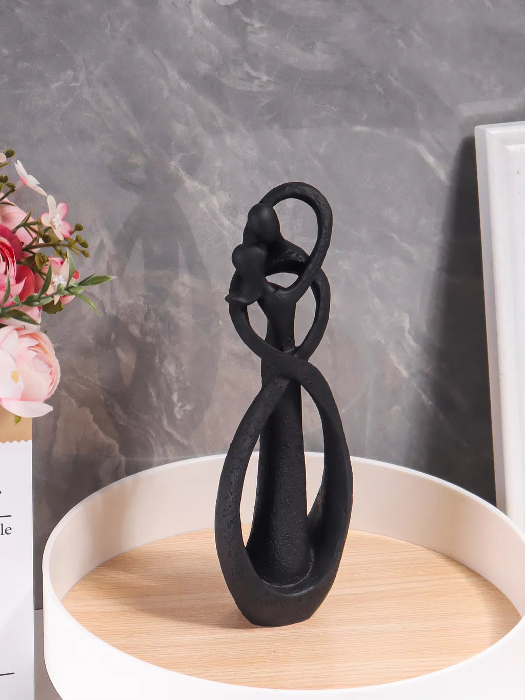 Embracing Couple Sculpture